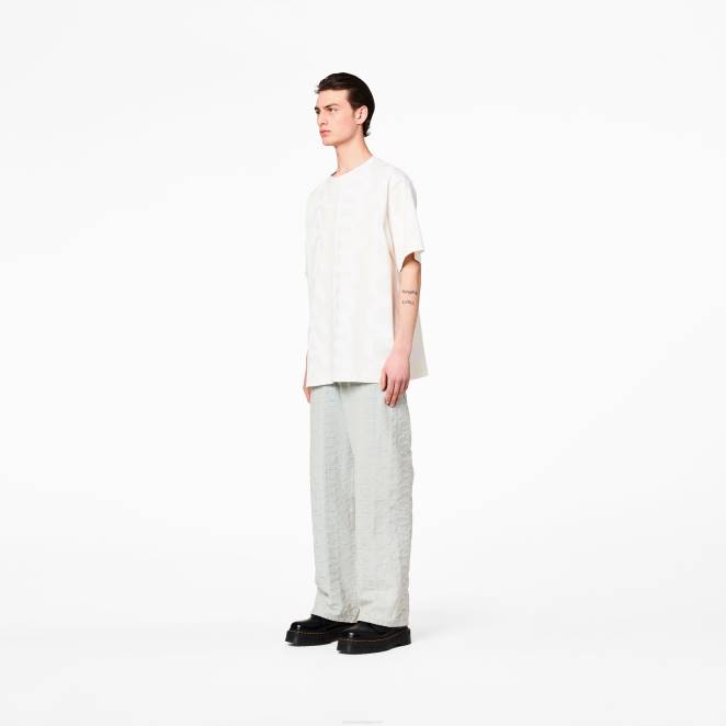 le pantalon en denim à monogramme Marc Jacobs R8NP477