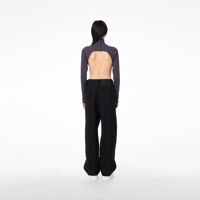 le pantalon en denim à monogramme Marc Jacobs R8NP491